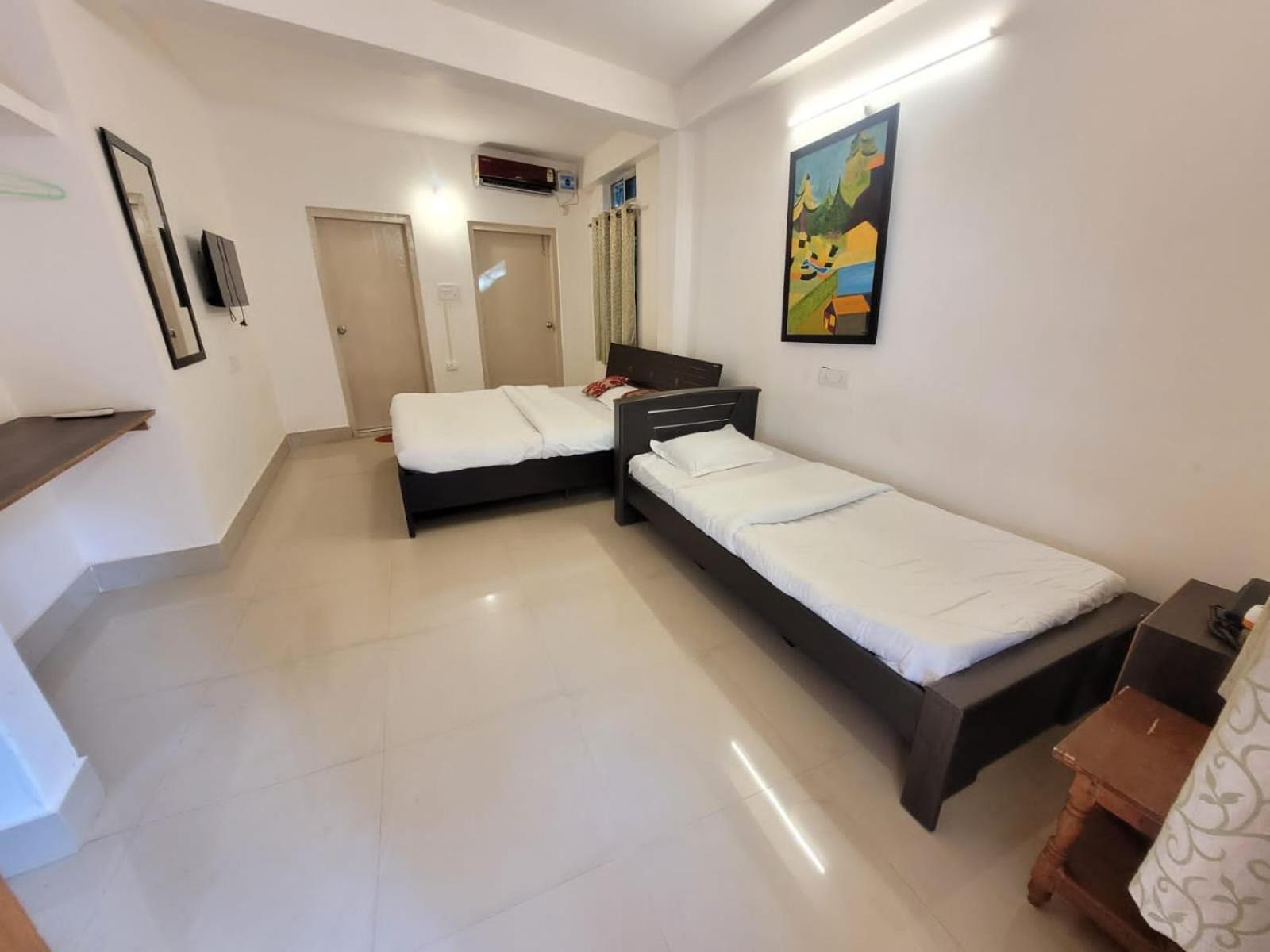 Hilltop Lodge Guwahati Bilik gambar